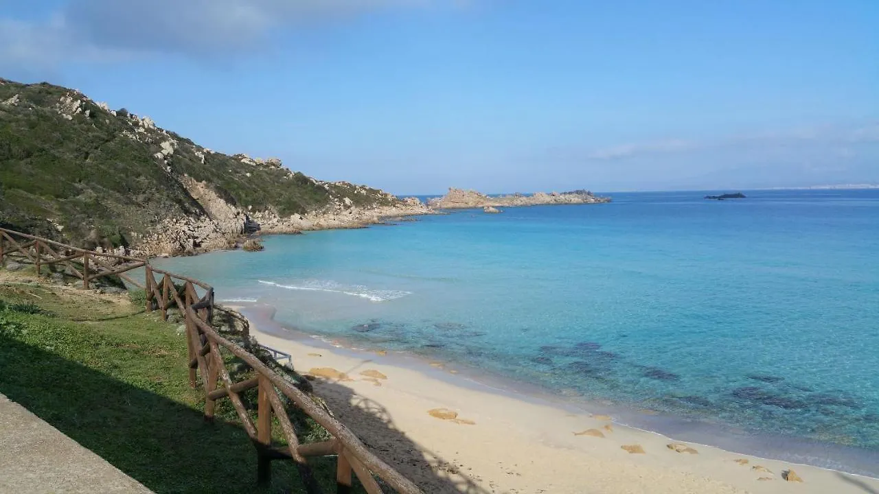 Bilocale con giardino privato, terrazza vista mare e incantevoli tramonti sul promontorio di Capo Testa - IUN Q2226 Santa Teresa di Gallura