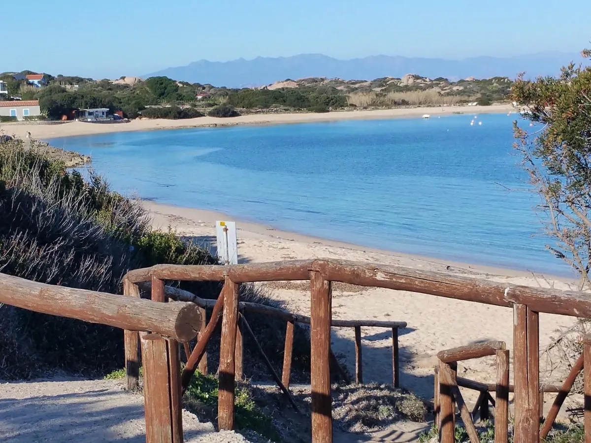 Bilocale con giardino privato, terrazza vista mare e incantevoli tramonti sul promontorio di Capo Testa - IUN Q2226 Santa Teresa di Gallura Appartamento