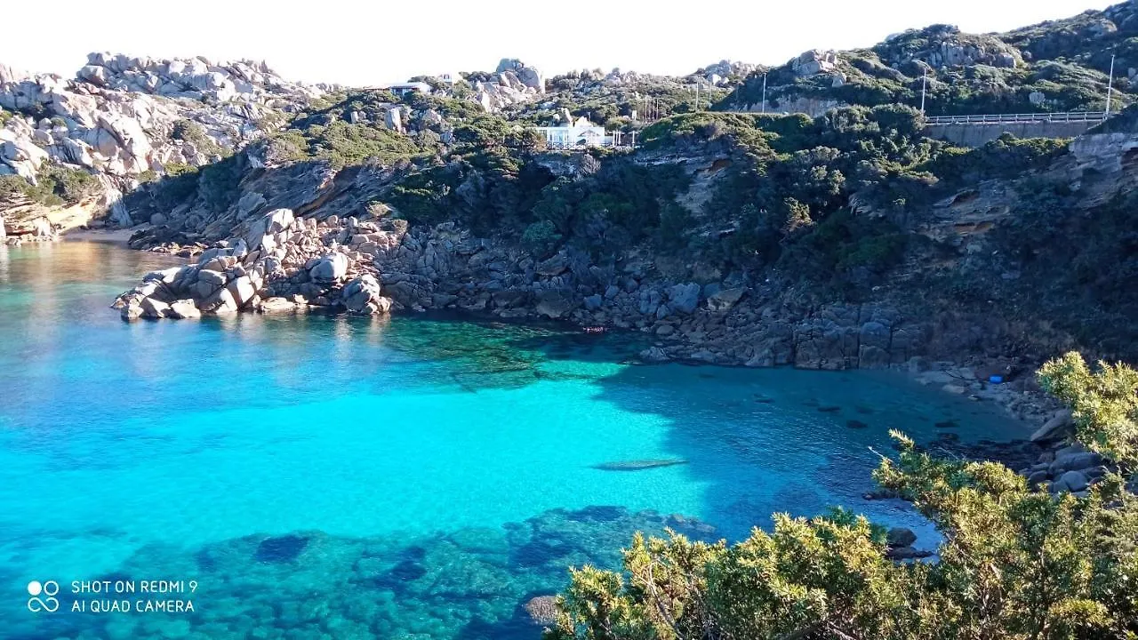 Bilocale con giardino privato, terrazza vista mare e incantevoli tramonti sul promontorio di Capo Testa - IUN Q2226 Santa Teresa di Gallura